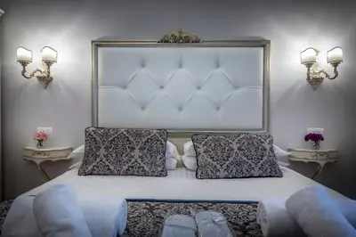 Letto o letti in una camera di B&B La Terrazza Sul Duomo