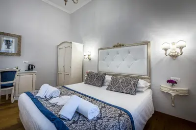 Letto o letti in una camera di B&B La Terrazza Sul Duomo