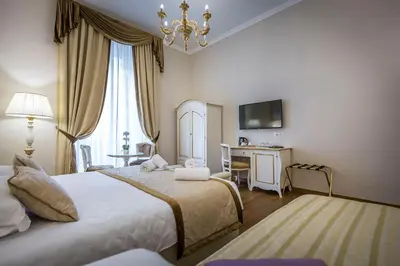Letto o letti in una camera di B&B La Terrazza Sul Duomo