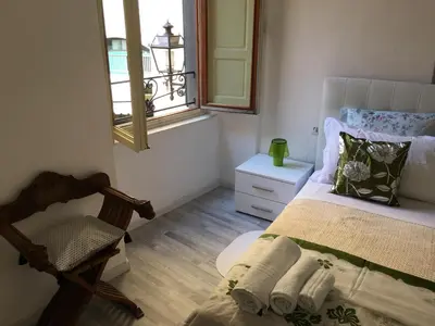 Letto o letti in una camera di La Tana Dei Leoni Affittacamere