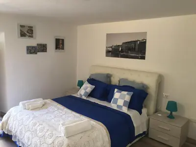 Letto o letti in una camera di La Tana Dei Leoni Affittacamere