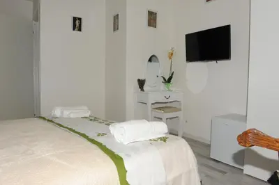 Letto o letti in una camera di La Tana Dei Leoni Affittacamere