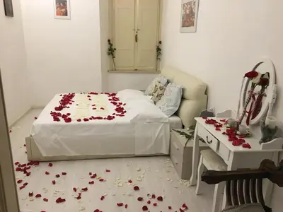 Letto o letti in una camera di La Tana Dei Leoni Affittacamere