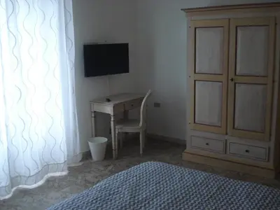 TV o dispositivi per l'intrattenimento presso Scala Apartment