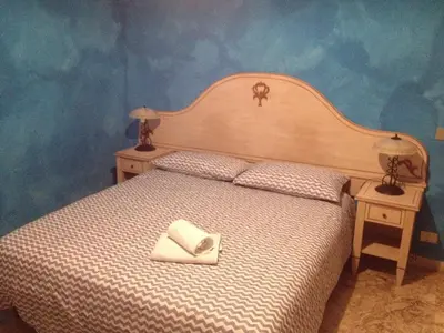 Letto o letti in una camera di Scala Apartment