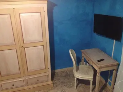 TV o dispositivi per l'intrattenimento presso Scala Apartment