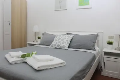 Letto o letti in una camera di Santa Croce Exclusive