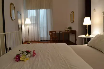 Letto o letti in una camera di Santa Croce Exclusive
