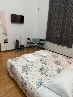 Letto o letti in una camera di Rooms77 Florence centro storico firenze