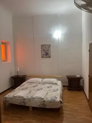 Letto o letti in una camera di Rooms77 Florence centro storico firenze
