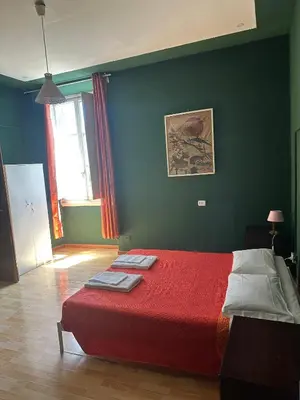 Letto o letti in una camera di Rooms77 Florence centro storico firenze