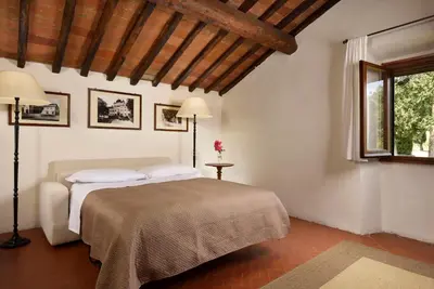 Letto o letti in una camera di Villa Ortaglia Estate
