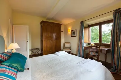Letto o letti in una camera di Villa Ortaglia Estate