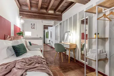 Area soggiorno di Wine Apartments Florence Ciliegiolo