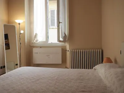 Letto o letti in una camera di 3 Perle all'Accademia Apartments