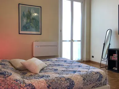 Letto o letti in una camera di 3 Perle all'Accademia Apartments