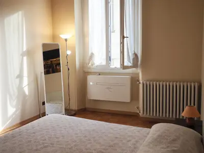Letto o letti in una camera di 3 Perle all'Accademia Apartments