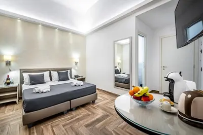 Letto o letti in una camera di B&B Lorenzo de' Medici