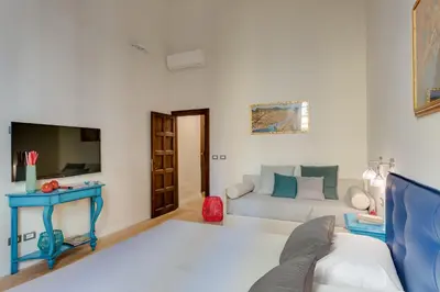 TV o dispositivi per l'intrattenimento presso Residenza D'Epoca Historia Luxury Boutique
