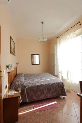 Letto o letti in una camera di Hotel Margaret