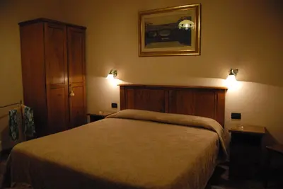 Letto o letti in una camera di Hotel Margaret