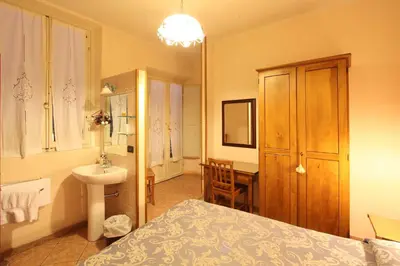 Letto o letti in una camera di Hotel Margaret