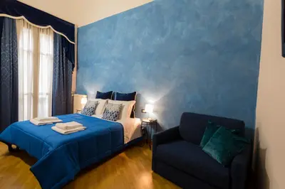 Letto o letti in una camera di La Locandiera B&B