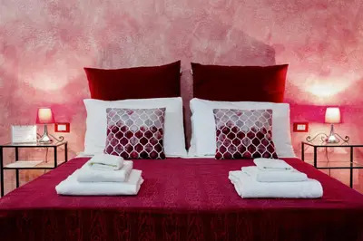 Letto o letti in una camera di La Locandiera B&B
