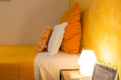 Letto o letti in una camera di La Locandiera B&B