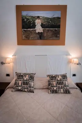 Letto o letti in una camera di Il Salotto Di Firenze