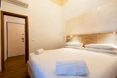 Letto o letti in una camera di N4U Guest House Florence