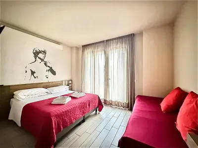 Letto o letti in una camera di B&B Santa Maria Novella