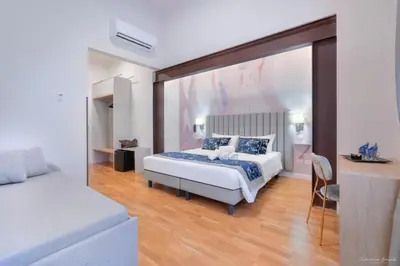 Letto o letti in una camera di Hotel Cosmos