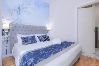 Letto o letti in una camera di Hotel Cosmos