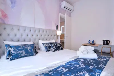 Letto o letti in una camera di Hotel Cosmos