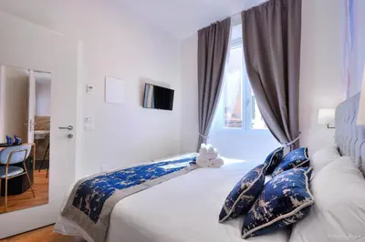 Letto o letti in una camera di Hotel Cosmos