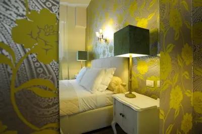 Letto o letti in una camera di Luxury B&B La Dimora Degli Angeli