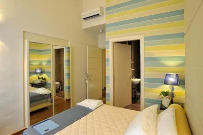 Letto o letti in una camera di Luxury B&B La Dimora Degli Angeli