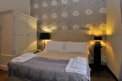 Letto o letti in una camera di Luxury B&B La Dimora Degli Angeli