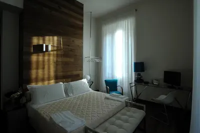 Letto o letti in una camera di Luxury B&B La Dimora Degli Angeli