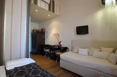 Letto o letti in una camera di Luxury B&B La Dimora Degli Angeli