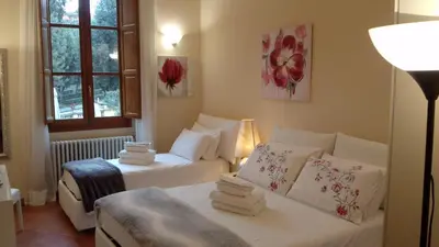 Letto o letti in una camera di Suite Imperiale Florence