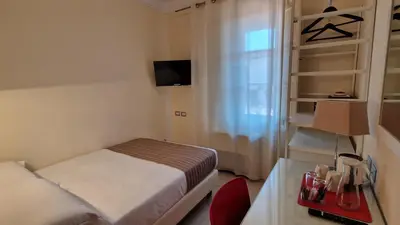 Letto o letti in una camera di Residenza Fiorentina
