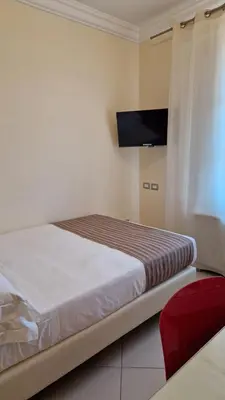 Letto o letti in una camera di Residenza Fiorentina