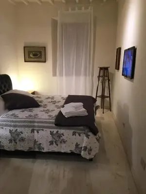 Letto o letti in una camera di Duomo Residence Florence
