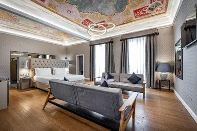 Letto o letti in una camera di Martelli 6 Suite & Apartments