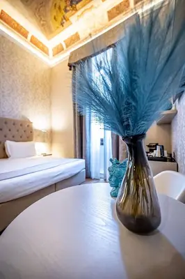 Letto o letti in una camera di Martelli 6 Suite & Apartments