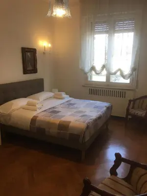 Letto o letti in una camera di Cherubini Florence Residence