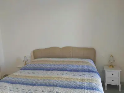 Letto o letti in una camera di Nancy House
