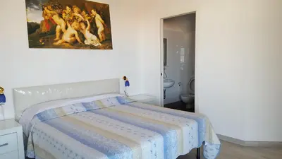 Letto o letti in una camera di Nancy House